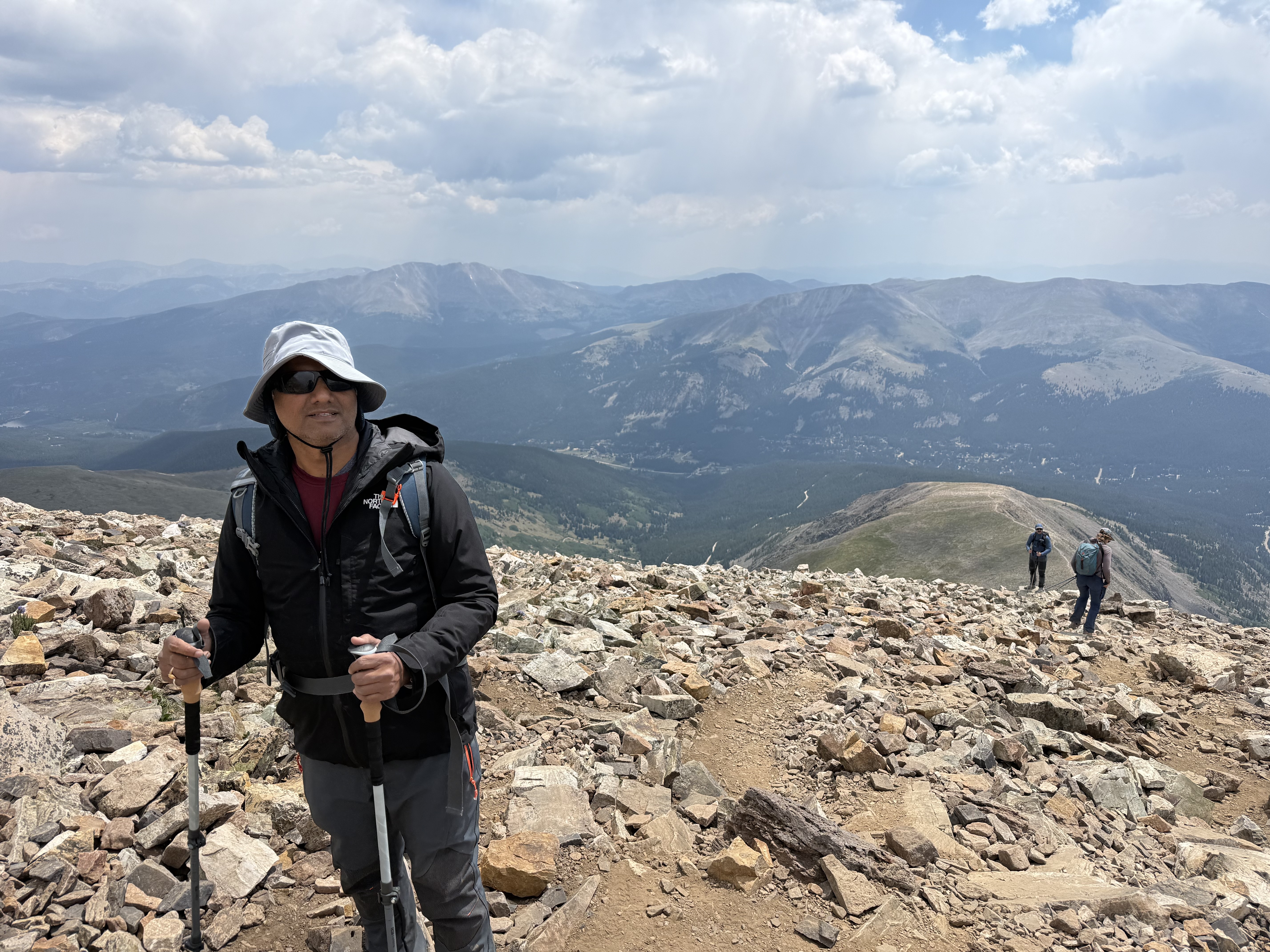 On the summit with the valley far below